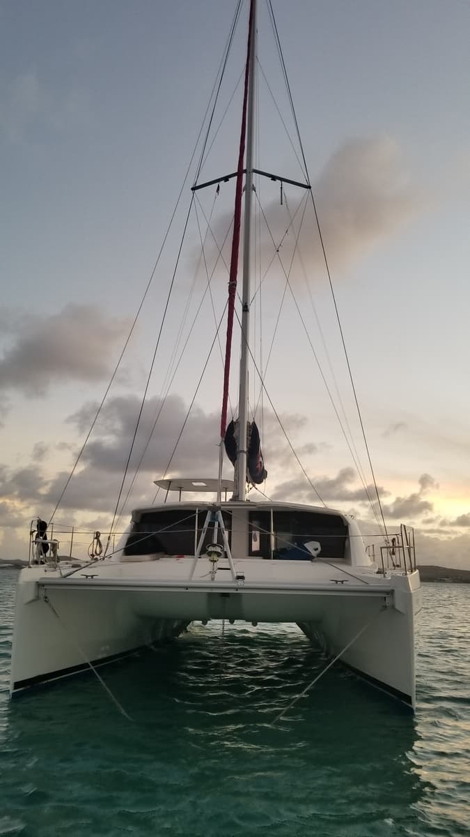 Looking forward over the bow trampoline at sunset